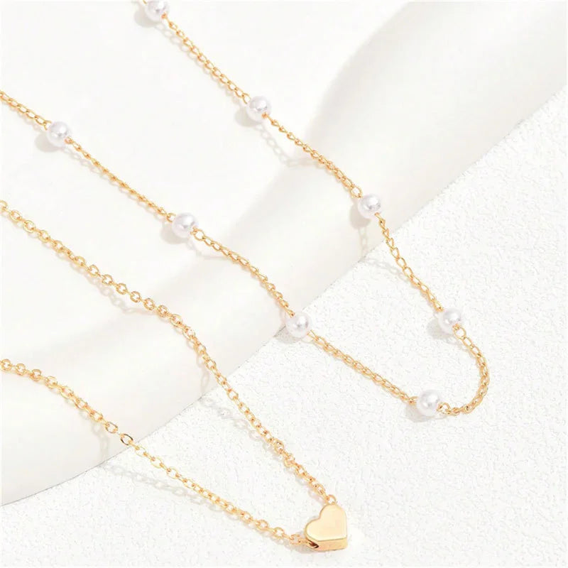 Pearl Choker Necklaces and small heart necklace